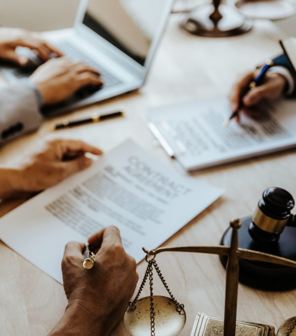 Businessmen and lawyers discuss contract documents. sign a business contract.